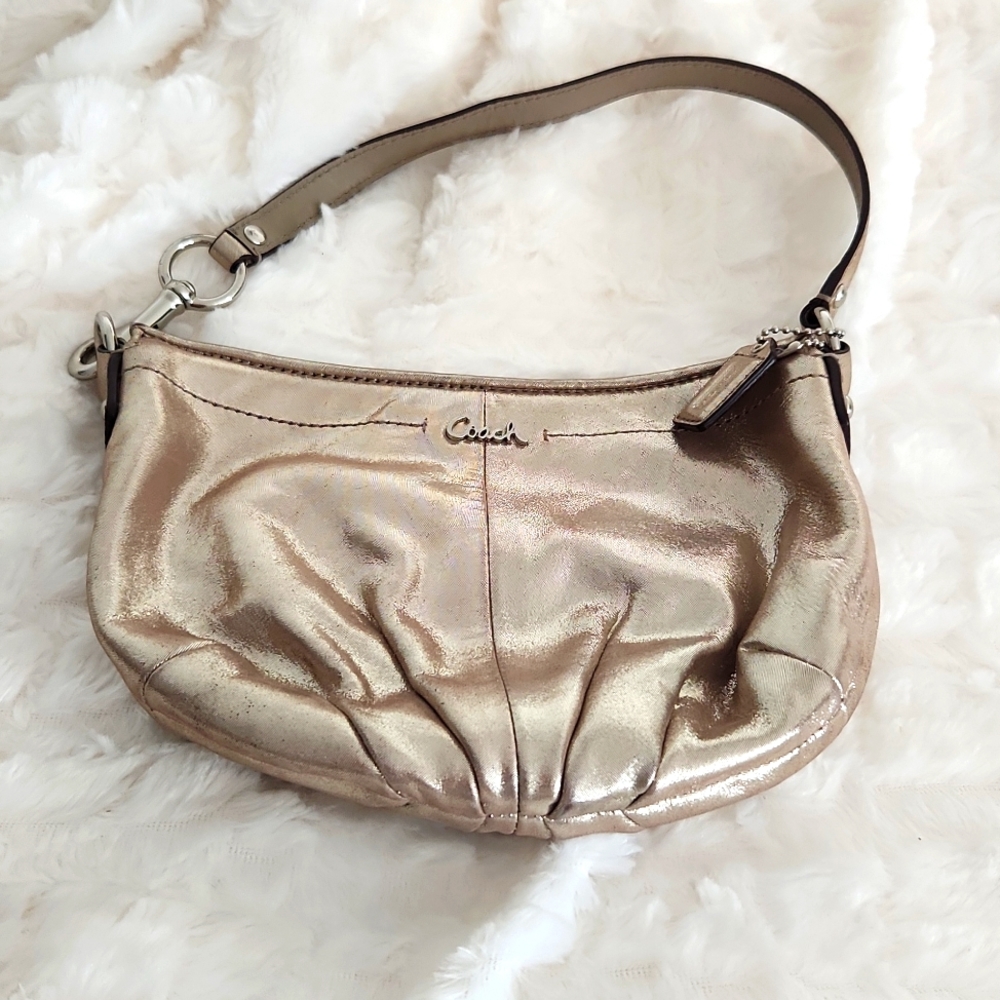 Coach purse champagne in color